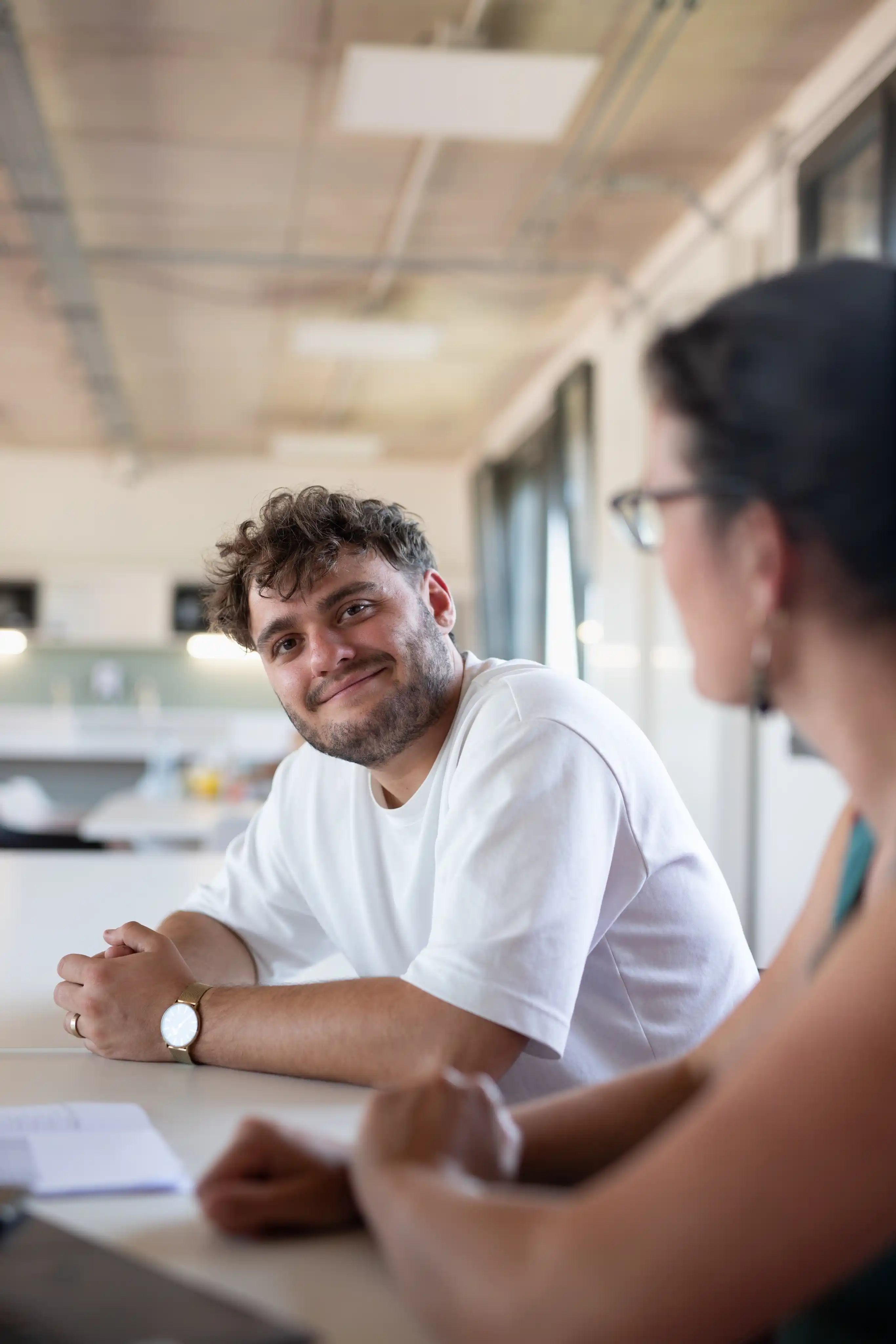 Jean in meeting to develop educational solutions